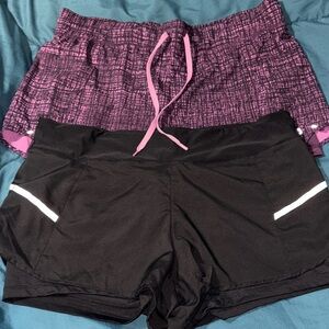 Hind Black Athletic Shorts with Purple Patterned Overlay